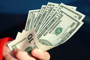hand holding dollars